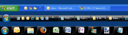 Hvordan bruke oppgavelinjen i Windows 7