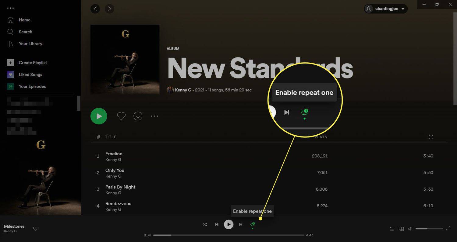 Kaip įdėti dainą į kartojimą „Spotify“.